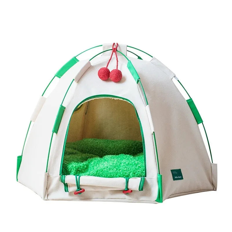 Grey dome-shaped cloth pet tent with a thick padded base for a cat.