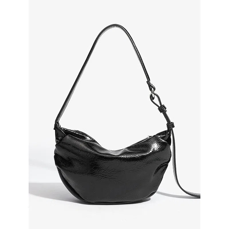Black pleated dumpling-shaped PU shoulder bag with three-dimensional outer pocket and rock-and-roll style