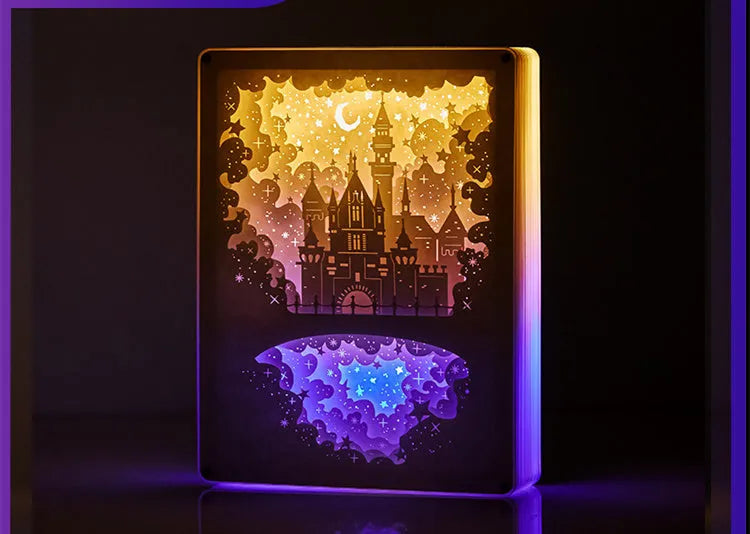 Modern white USB night light with a three-dimensional carved pattern and remote control on a wooden bedside table.