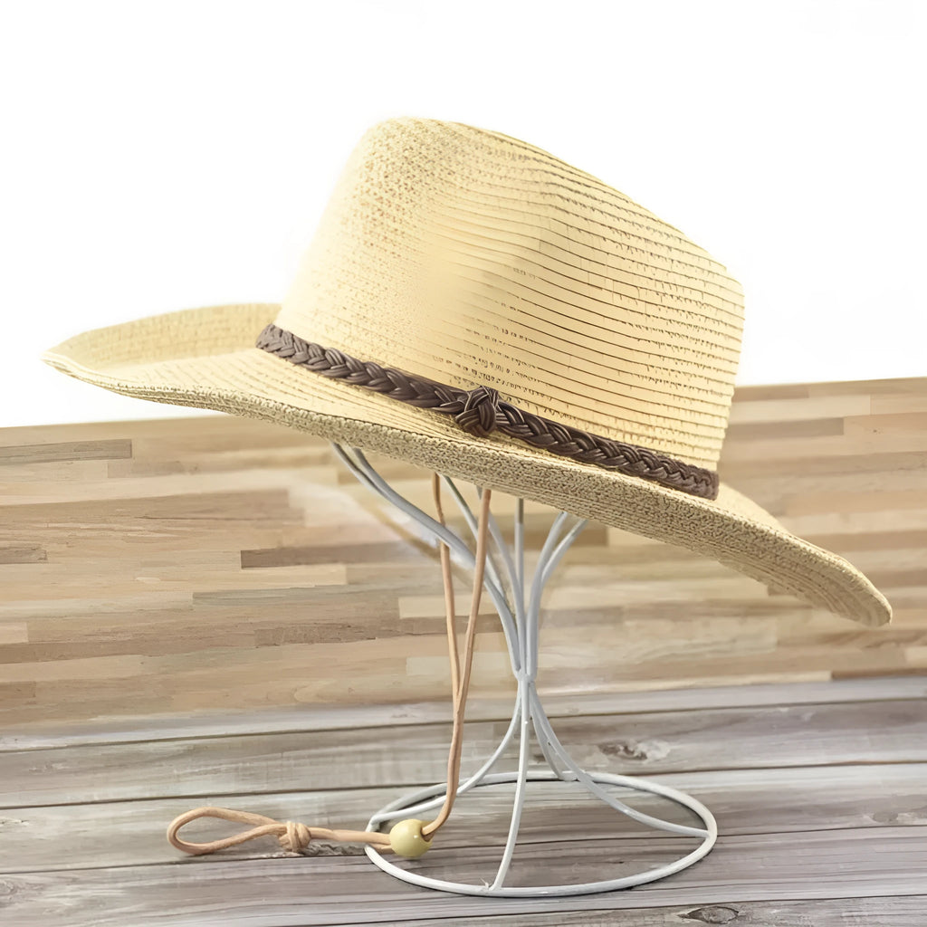 Men's foldable straw sun hat with wide brim in beige colour showing foldable design for summer outdoor use