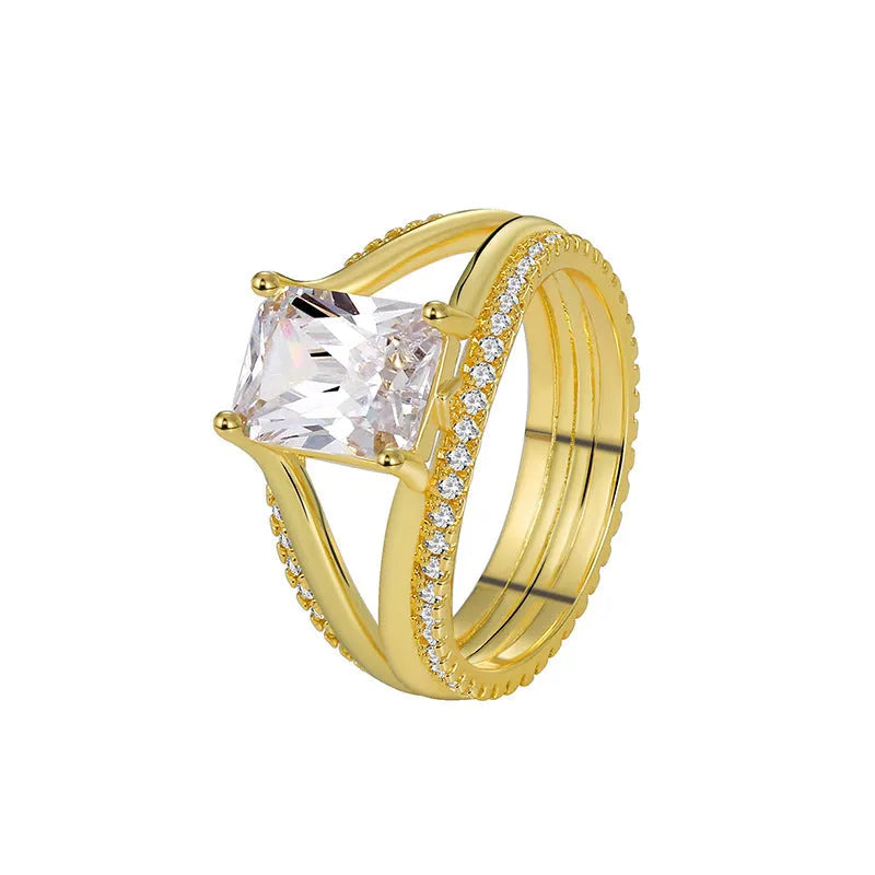 Women's geometric gold ring with square zircon centrepiece showing clean lines and electroplated finish