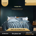 Household Fashion solid colour silk quilt cover and pillowcases on a bed, in a shade of Imperial Blue.