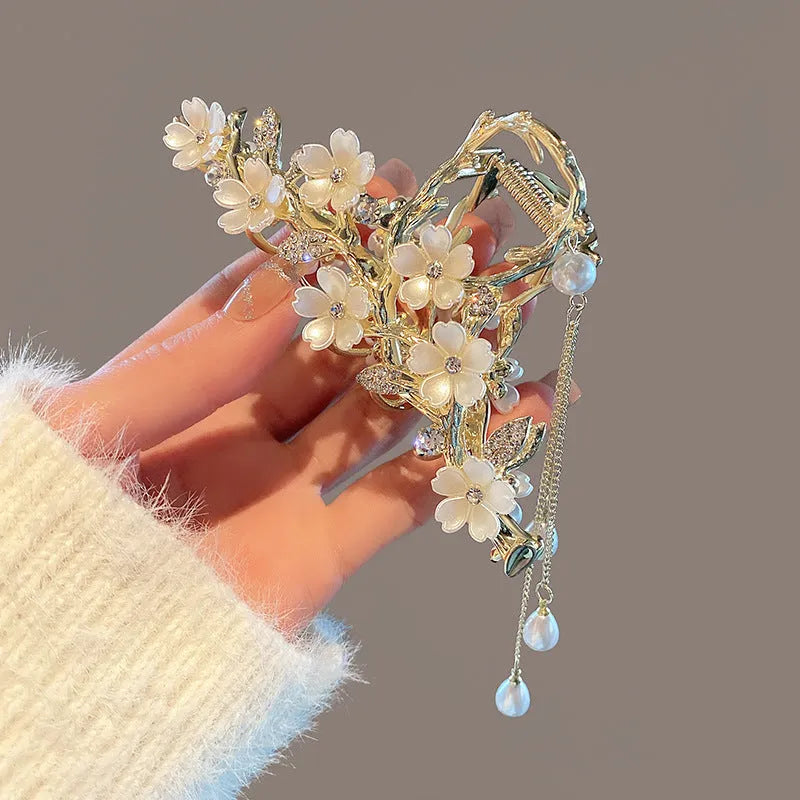 Large metal hair clip with pearl and diamond inlay, bell orchid tassel pendant, approximately 11.5cm length