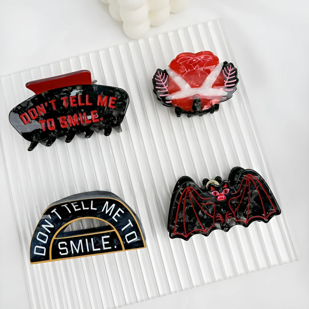 Halloween hair clip with detailed shark design and bat-shaped accents