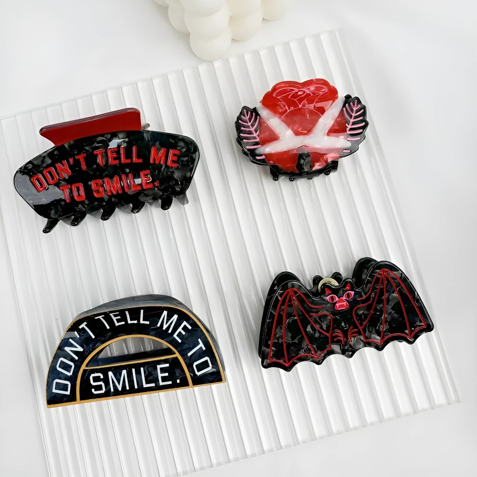 Halloween hair clip with detailed shark design and bat-shaped accents