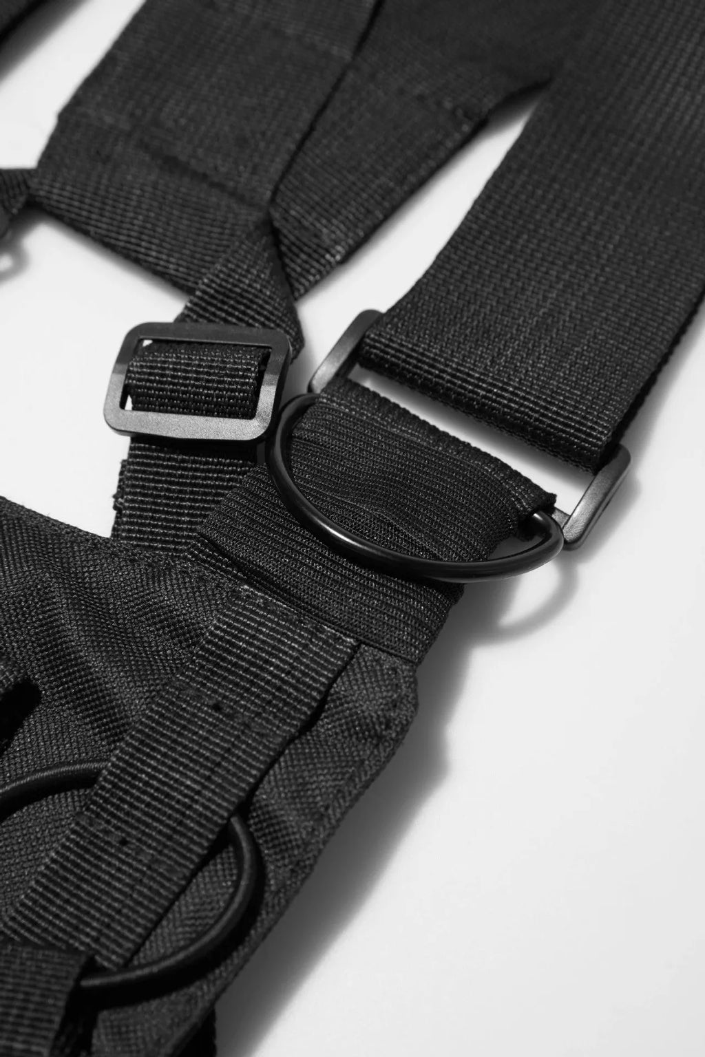 Black tactical tooling chest bag for men with Oxford cloth, striped pattern, and nylon lining