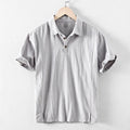 Men's loose fit cotton linen blend shirt in milky white colour showing casual summer styling