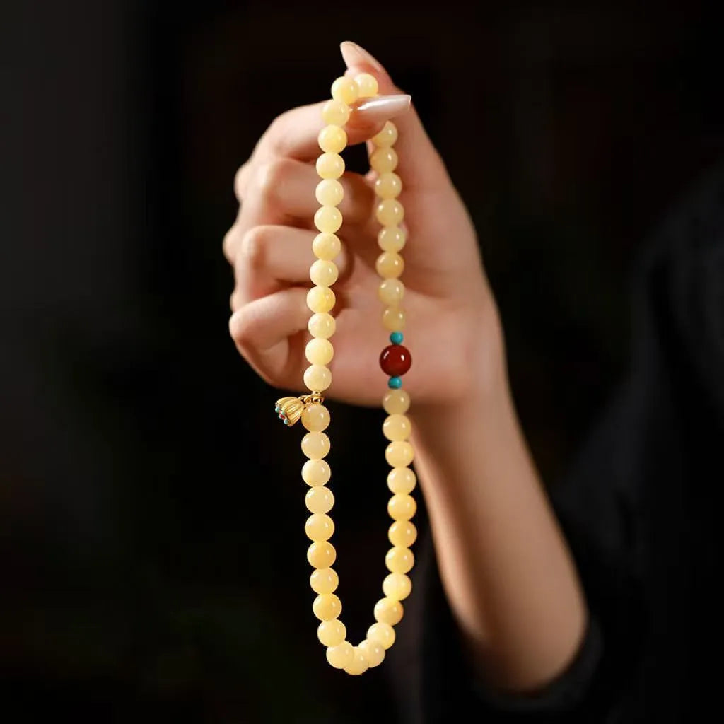 Handmade double ring bracelet for women with yellow jade and topaz stones in a retro design.