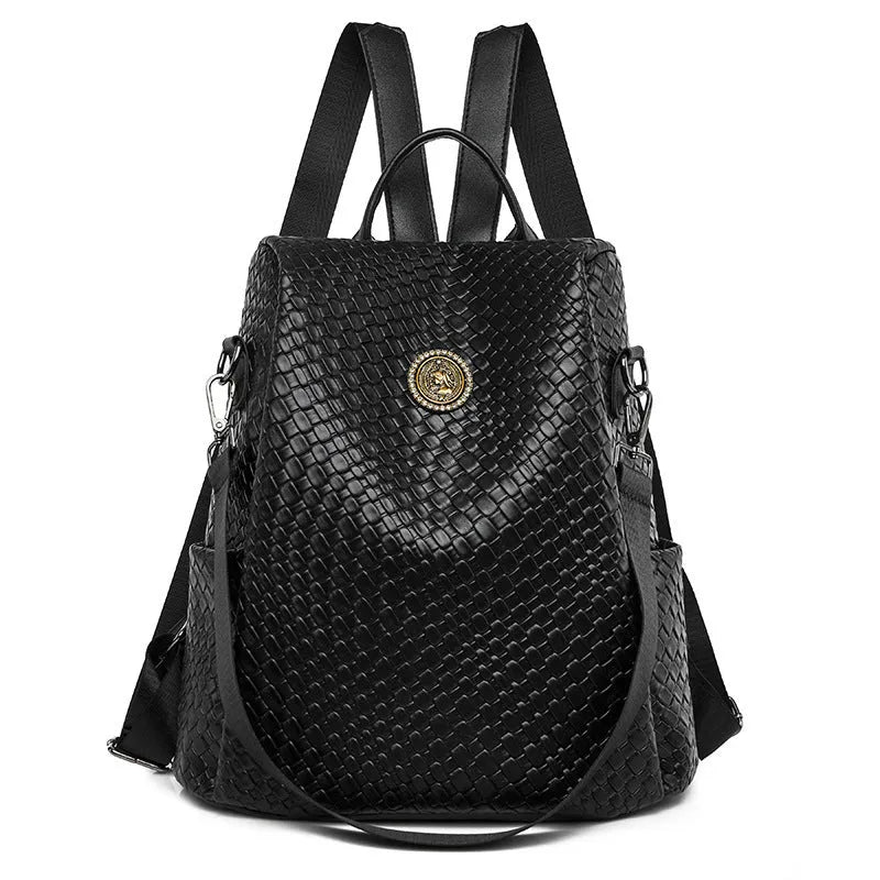 Women's black anti-theft backpack with organisational compartments and urban design details