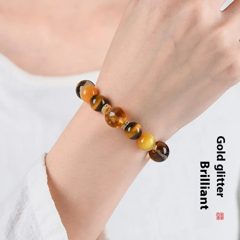 Natural yellow 10mm tower crystal string beads bracelet on wrist