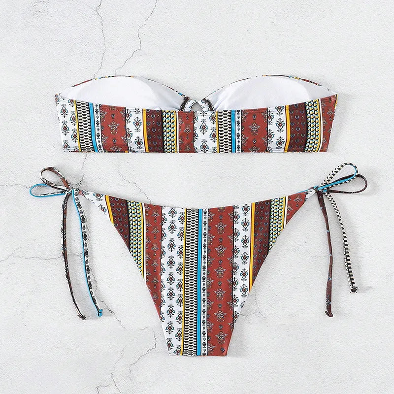 Women's printed lace-up split swimsuit in mixed colour, two-piece set with bra and pants, sleeves design, available in multiple sizes.