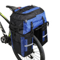 Rhinoceros 70-litre green bicycle rear storage bag mounted on a bike rack for touring.
