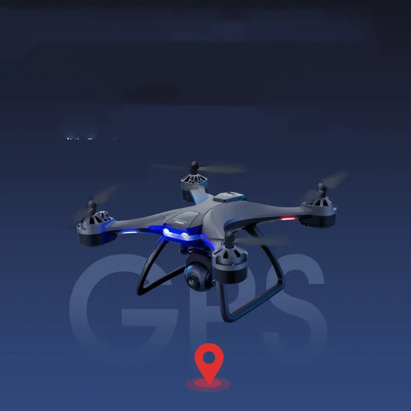 GPS remote control quadrocopter aircraft with dual cameras, spare blades, and handle controller on a table.