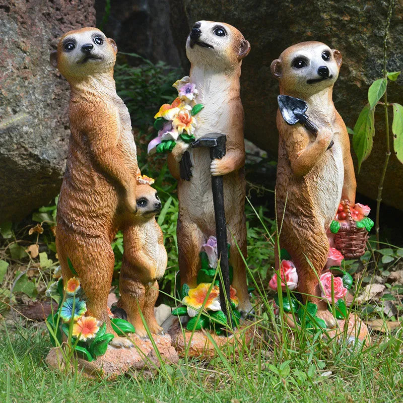 Straw hat mongoose garden ornament with mother and baby figures