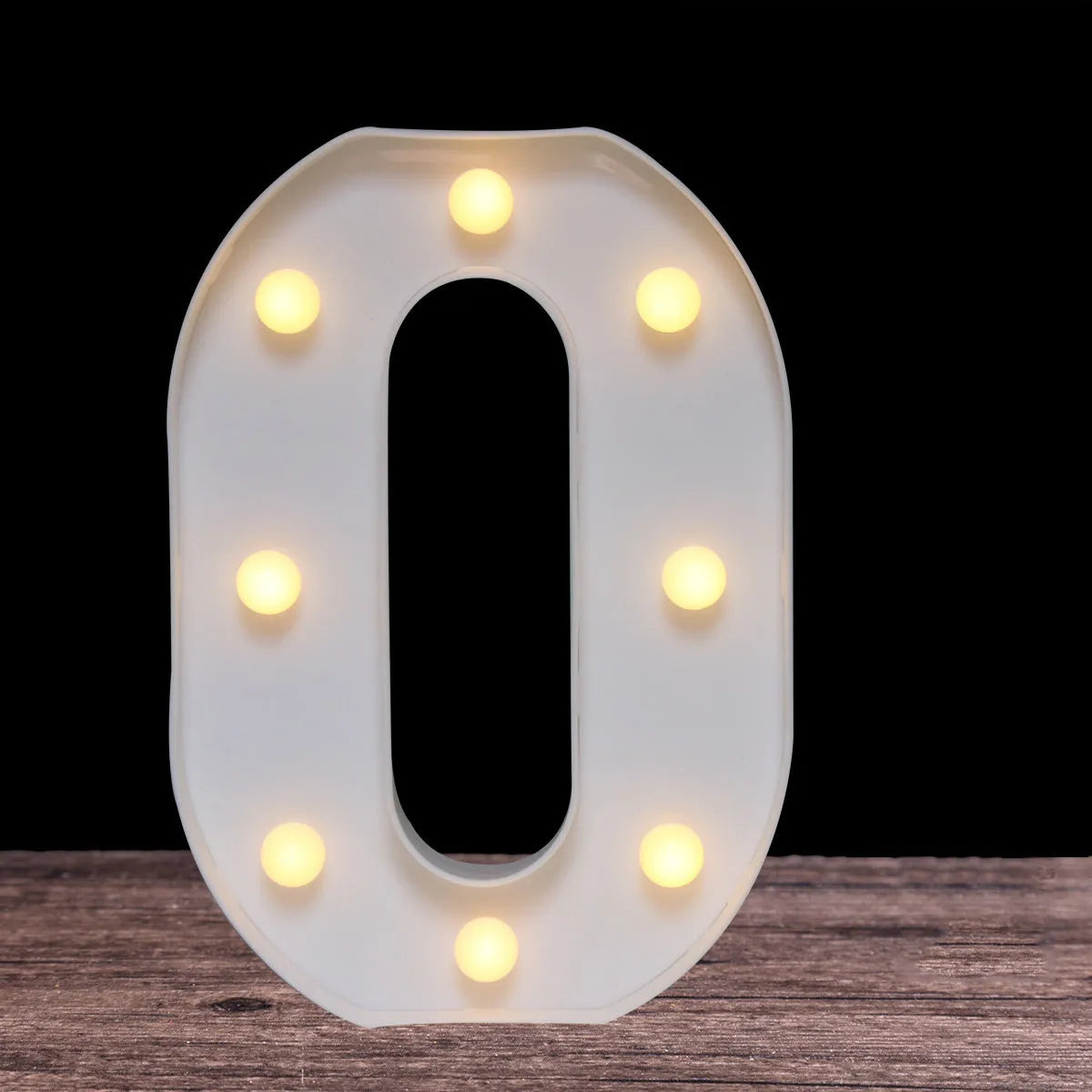 White plastic LED marquee letter sign with warm white glow, 22cm tall