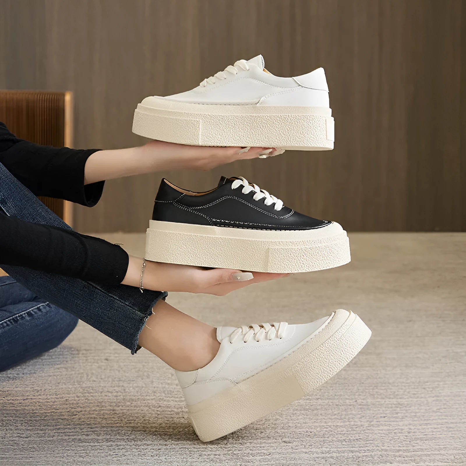 Women's black and white platform sports board shoes with embossed cowhide uppers and round toe design