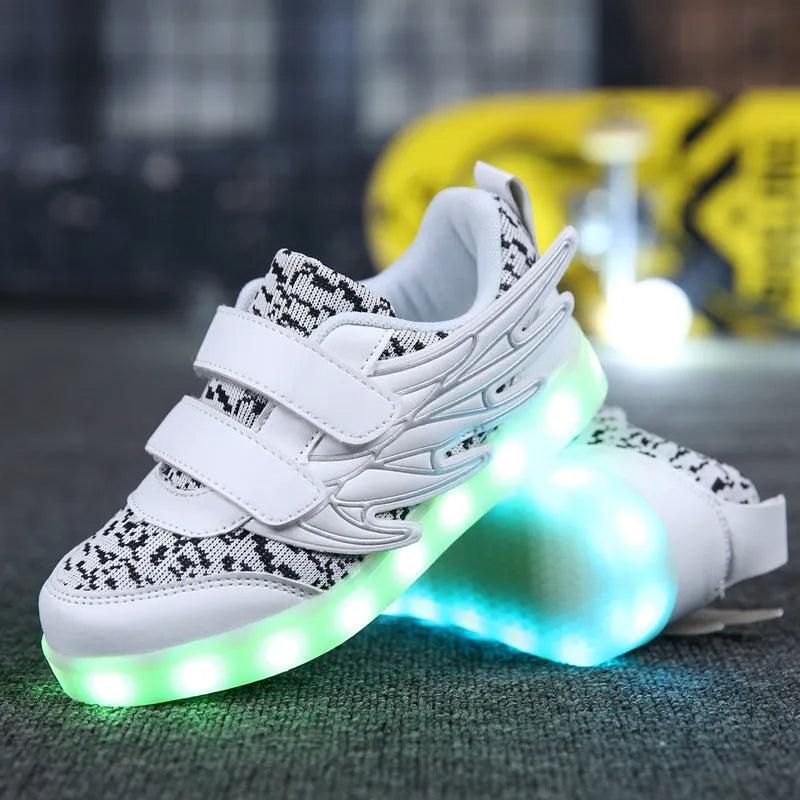 Children's plum red and white LED light-up trainers with colourful wing designs and USB charging port.
