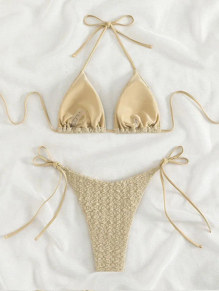 Women's high waist bikini swimsuit with lace-up side detail in polyester fabric