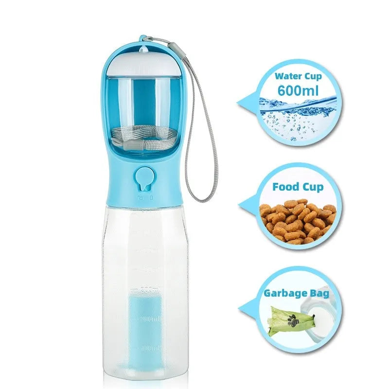 Turquoise portable 3-in-1 dog water bottle with food feeder and built-in poop bag dispenser on a walk