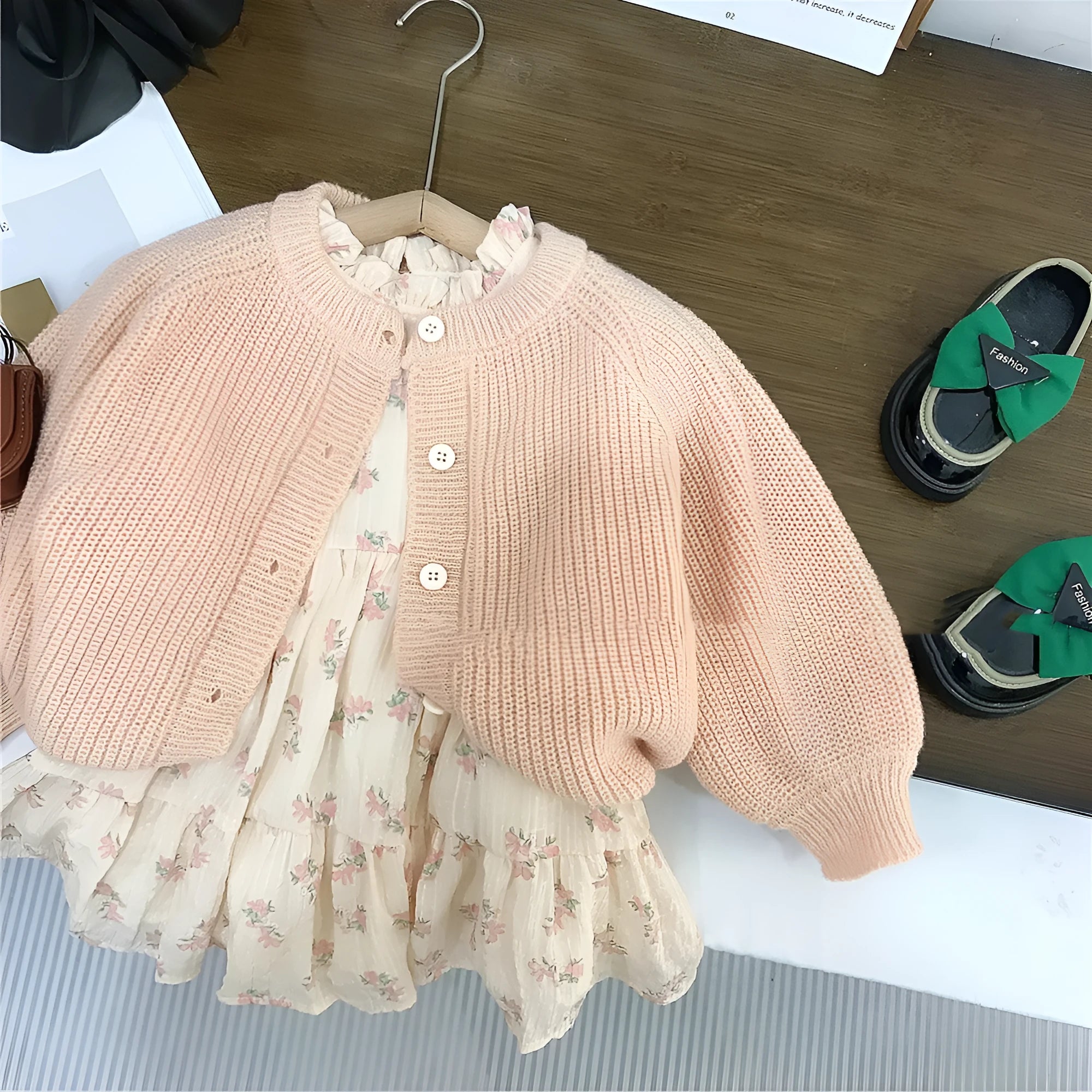 Girls' pink mohair puff sleeve knitted cardigan with orange flower chiffon dress set on white background
