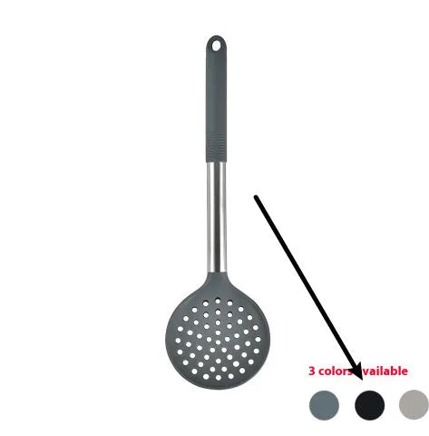 Silicone kitchen utensil set with twelve tools in a rotating white storage caddy on a counter.