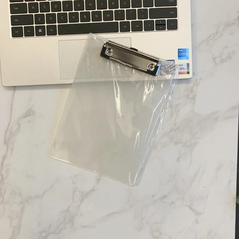 Clear plastic A4 plate holder with metal clip showing document inside, available in blue, green, red and white colours