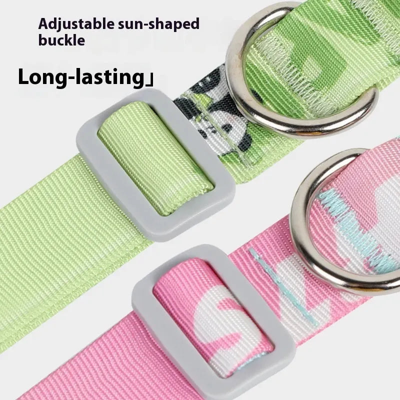 Adjustable nylon dog collar with blue gradient and cartoon panda print, showing plastic quick-release buckle and metal D-ring.