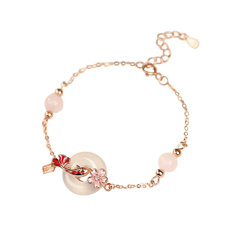 S925 sterling silver bracelet with white chalcedony crystal in a koi bracelet design for women.