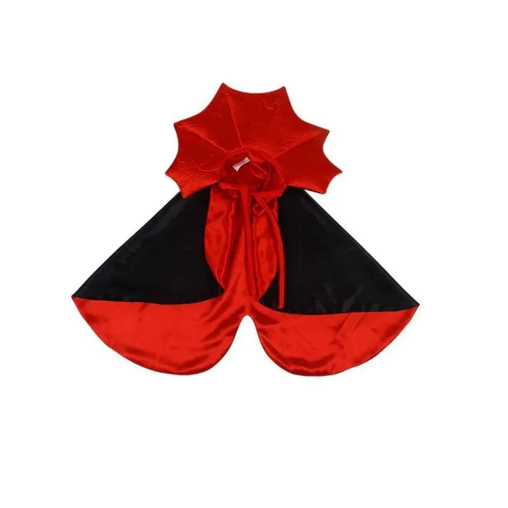 Black vampire cloak Halloween costume on a small dog or cat