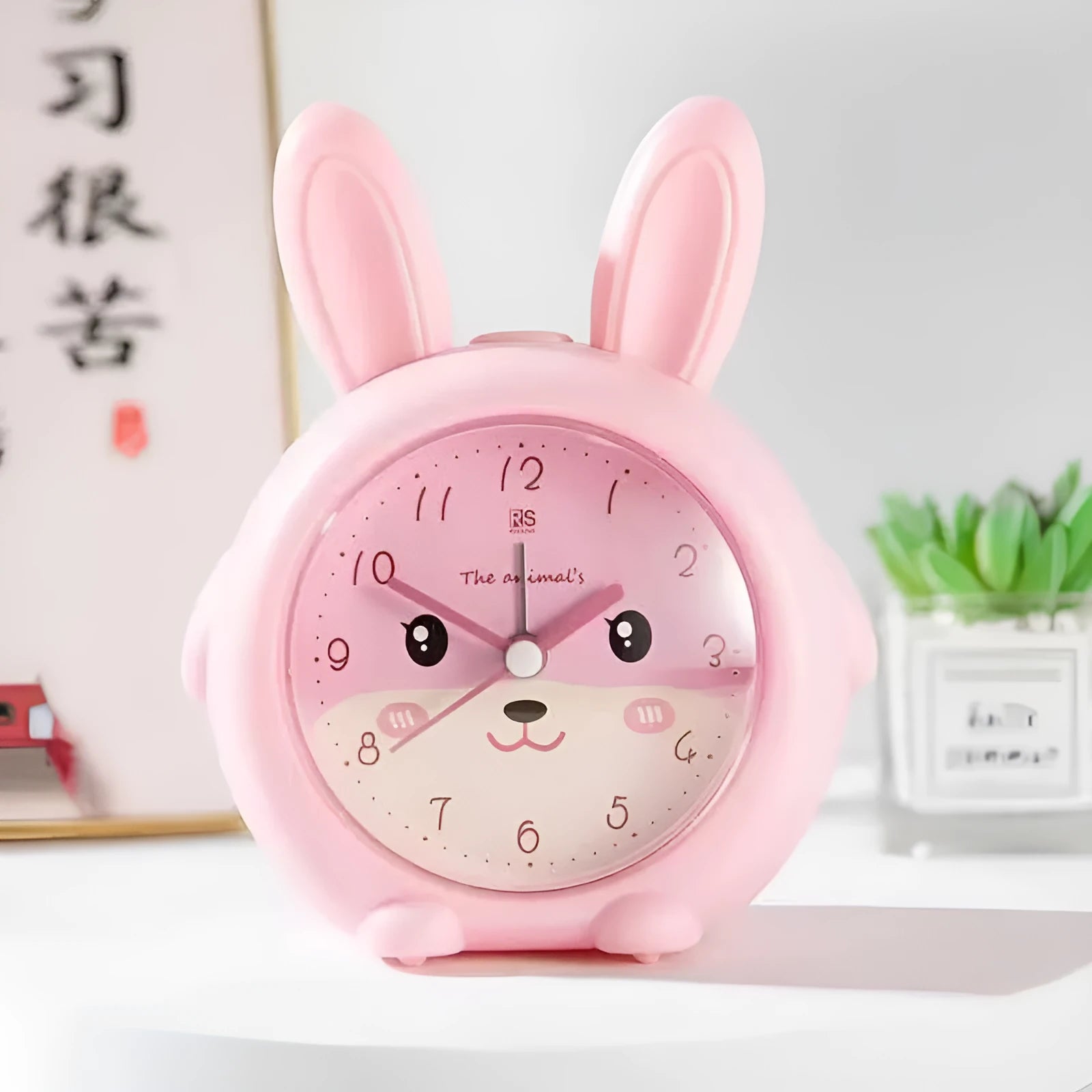 Colourful cartoon children's alarm clock with singing alarm and night light.