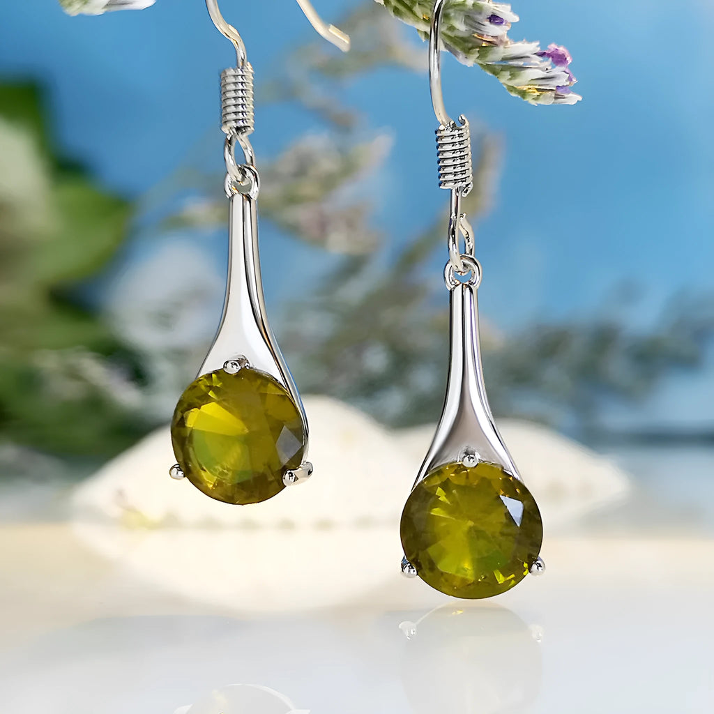 Olive green topaz drop earrings with water drop shape and electroplated alloy construction