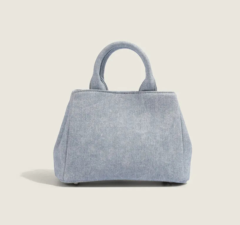 Women's casual denim blue PU shoulder handbag with standard size and polyester lining