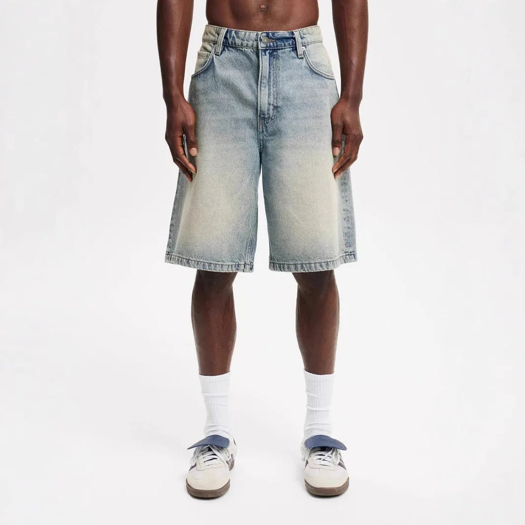 Men's straight leg cotton jeans in light blue colour showing front view