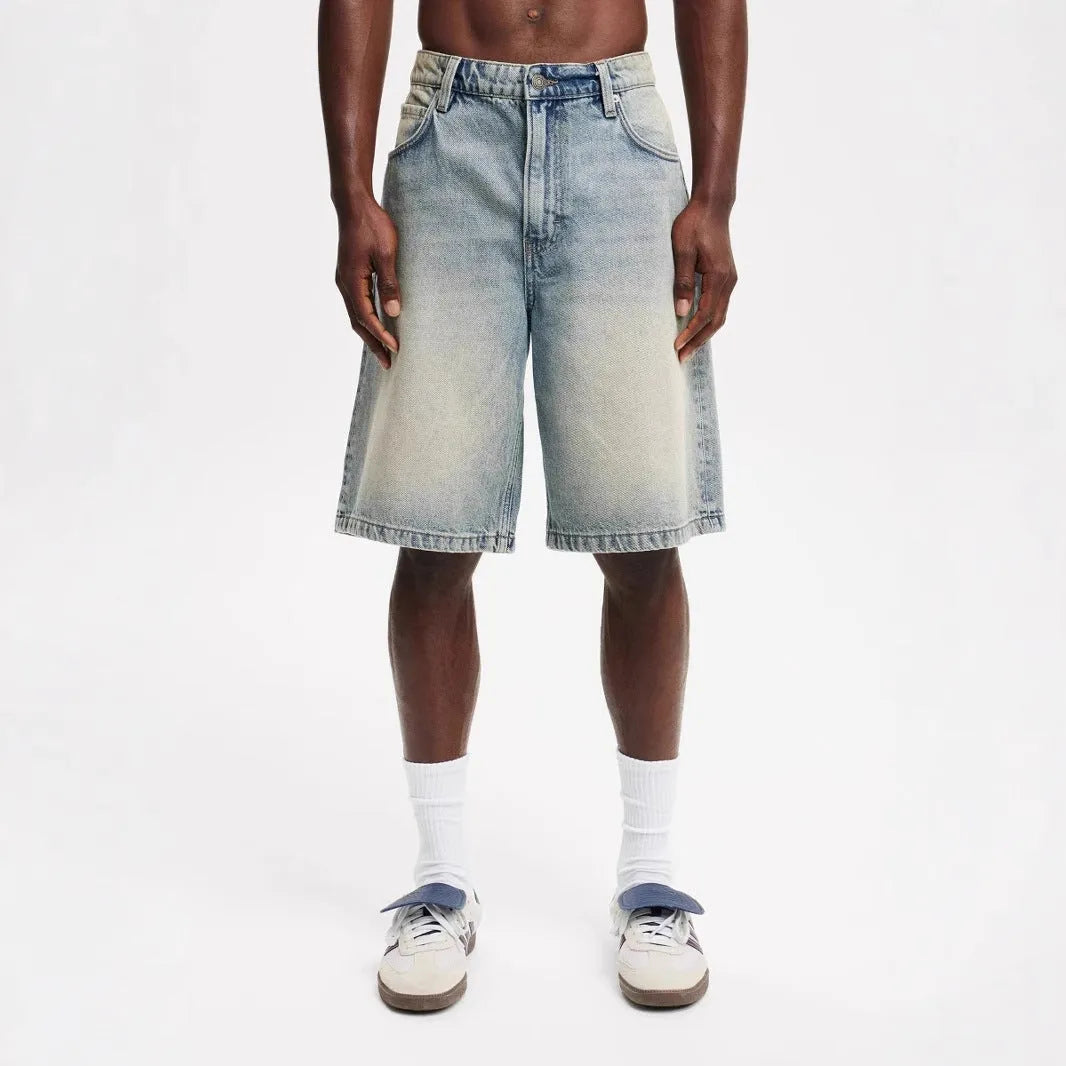 Men's straight leg cotton jeans in light blue colour showing front view
