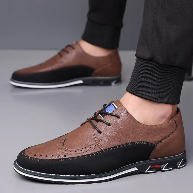 Men's low-top casual leather shoes with a leather toe cap and sewing line detail on fabric upper.