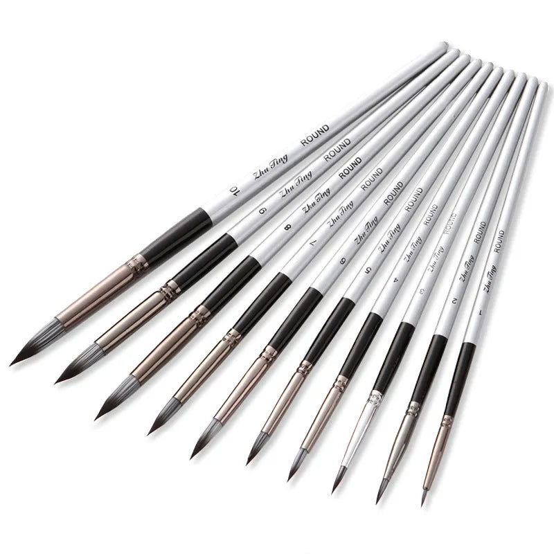 Ten black stick nylon paintbrushes with round tips, silver gray rods, and wood handles laid out