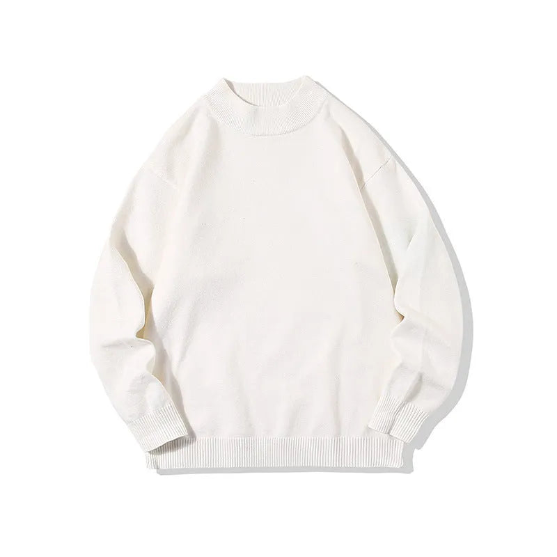 Man wearing a loose grey round neck long sleeve polyester sweater for casual spring or autumn attire.