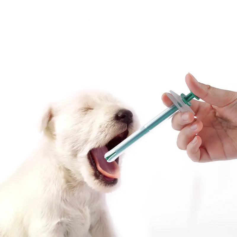 Two pet pill shooter tools with soft silicone tips for medicine feeding to cats and dogs