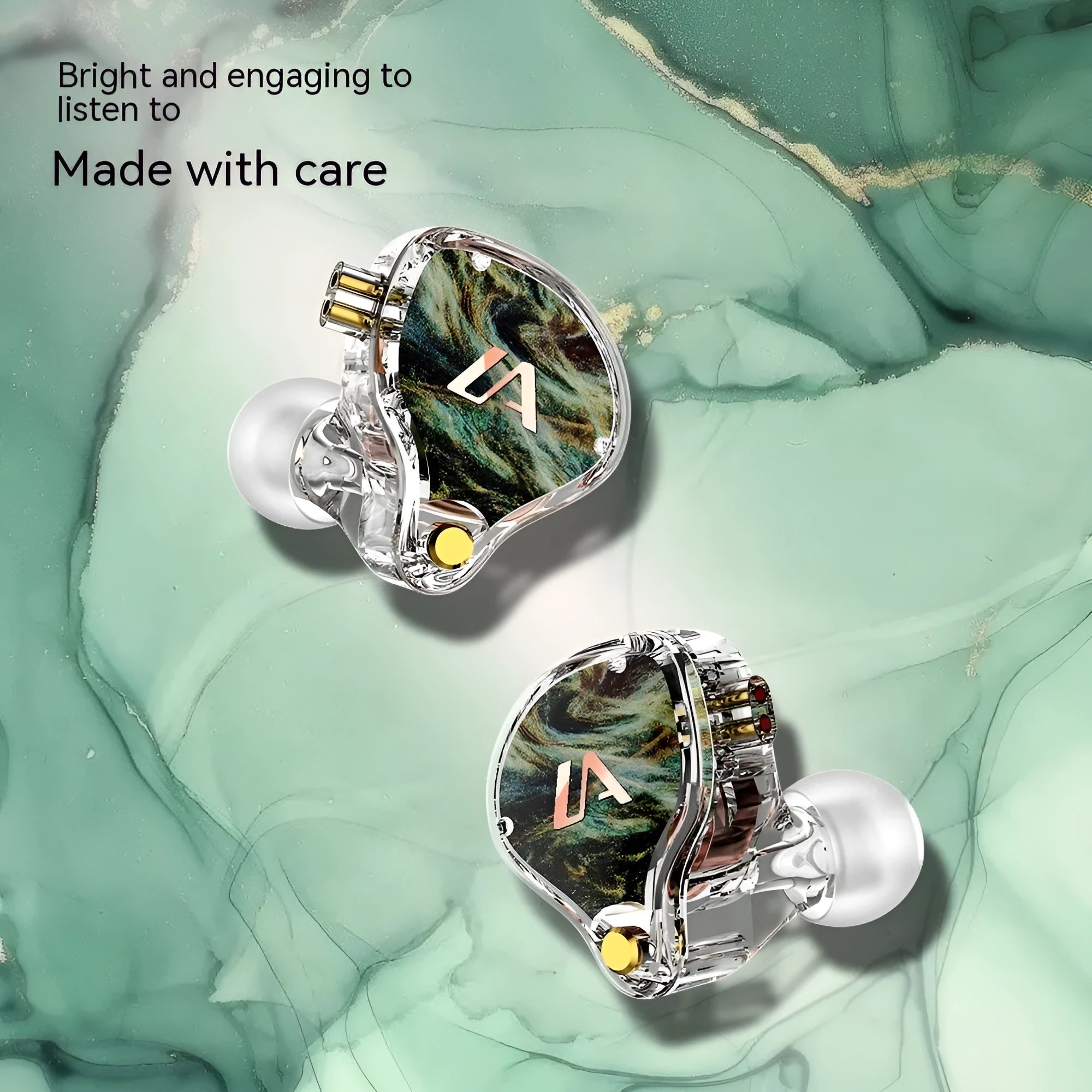 LM3 wired ear-mounted headphones with adjustable ear hook, silver-plated cable, and 3.5mm plug on a white background