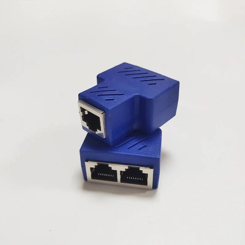 A white RJ45 network splitter adapter with one male and two female Ethernet ports.