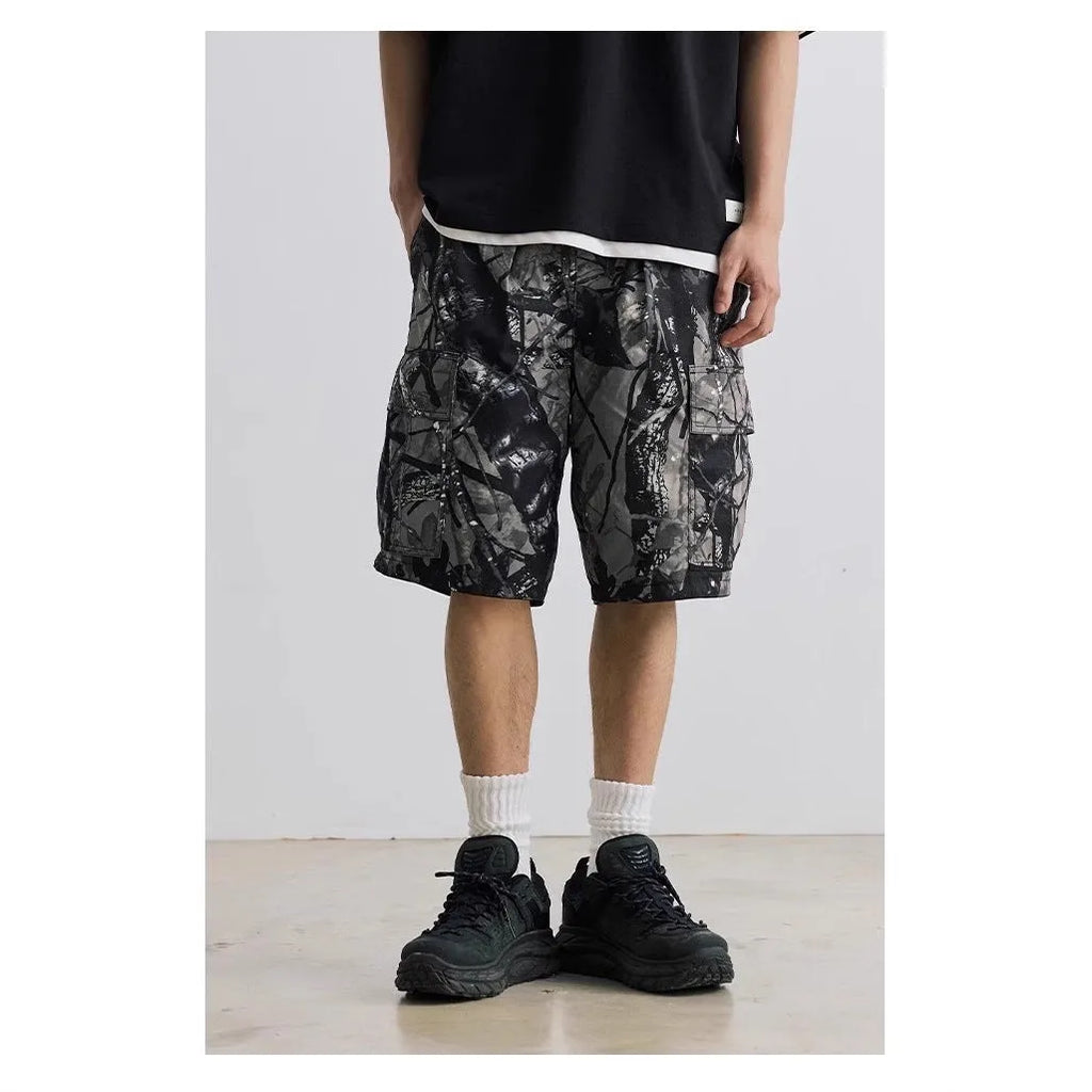Men's loose fit denim shorts in army green with an elasticated waistband and straight leg.