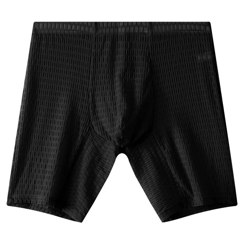 Men's knitted lace boxer shorts in light purple on a mid-toned background, showing mid-waist and transparent fabric detail.
