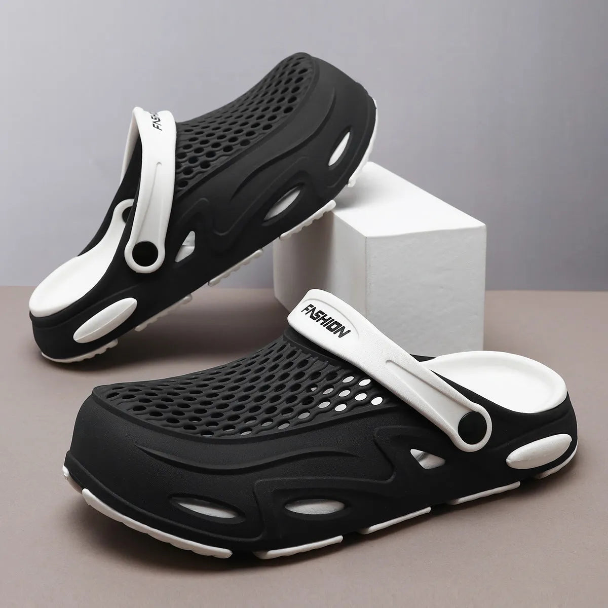 Men's grey closed toe beach slippers with non-slip sole and breathable grid pattern design