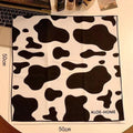 Colourful cartoon animal print nylon cosmetic bag in large, medium, and small sizes.
