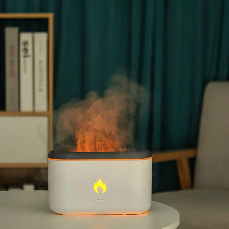 3D flame ultrasonic humidifier with 300ml water tank in white on a wooden desk