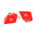 Pair of red and blue BMW M1 and M2 steering wheel mode buttons on a white background.