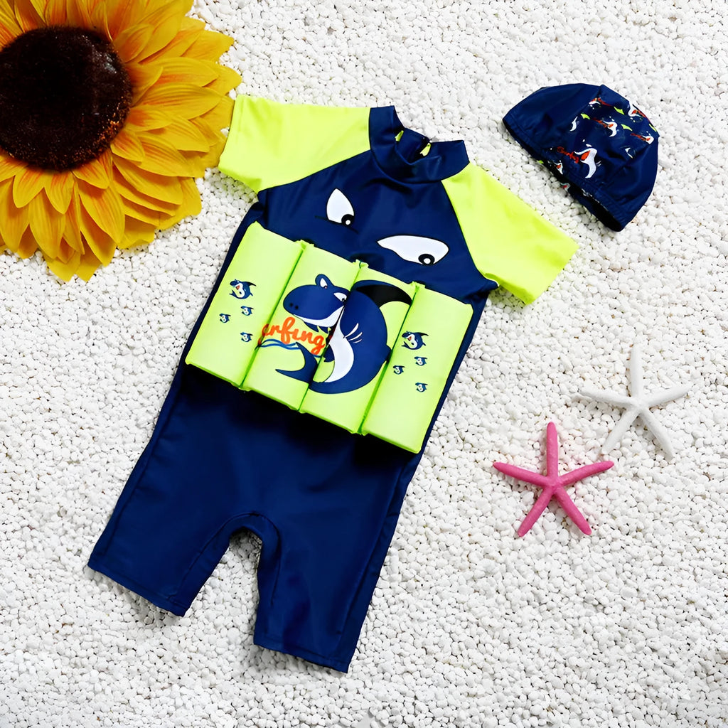 Child's one-piece buoyancy swimsuit in shark cartoon design for pool swimming