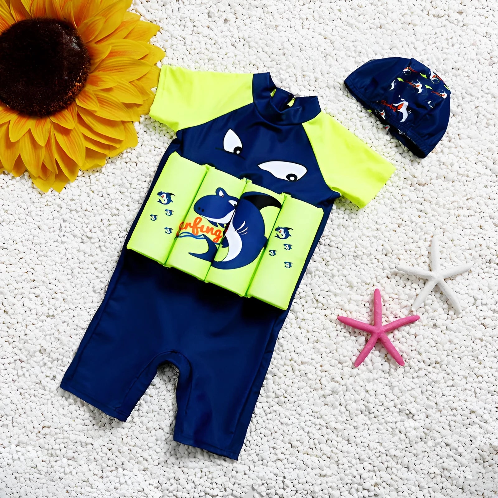 Child's one-piece buoyancy swimsuit in shark cartoon design for pool swimming