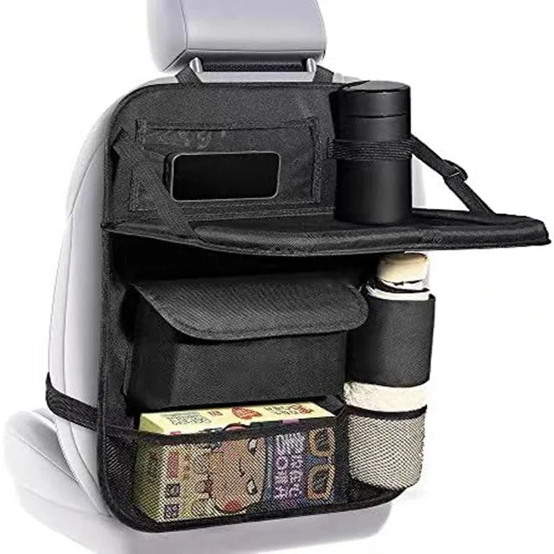 Black Oxford cloth car seat back buggy bag measuring 42x30cm hanging behind headrest