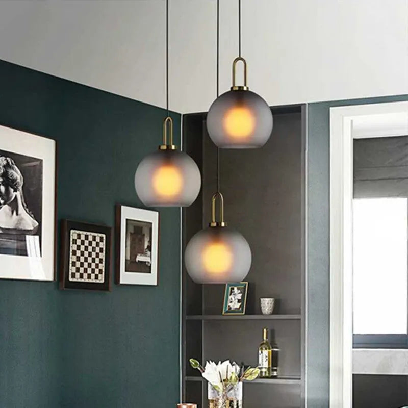 Nordic glass fish-shaped chandelier with iron body and adjustable height for modern interiors